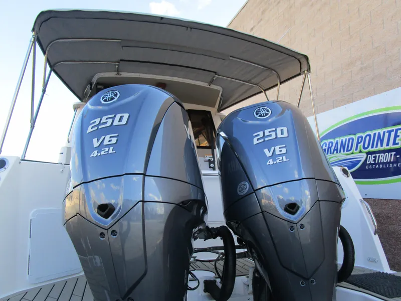 Slide: The Image of 2024 Cutwater C-288 C boat with dual Yamaha outboard engines on a trailer. - 10