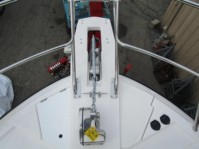 Slide: The Image of 2024 Cutwater C-288 C boat interior with modern design and sleek glass doors. - 12