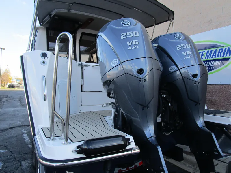 Slide: The Image of 2024 Cutwater C-288 C boat interior with sleek seating and modern design. - 15