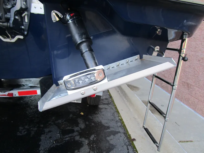 Slide: The Image of 2024 Cutwater C-288 C boat grill station with Kenyon grill and seating area. - 17