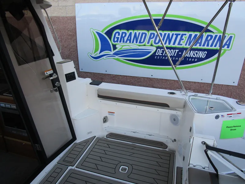 Slide: The Image of 2024 Cutwater C-288 C interior with seating, wood accents, and modern amenities. - 30