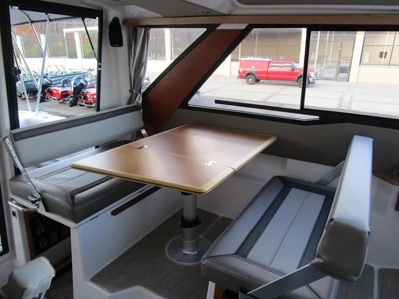 Slide: The Image of 2024 Cutwater C-288 C cabin interior with cozy bed and modern design. - 35