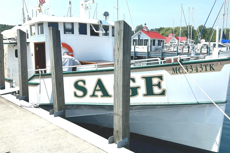 Slide: The Image of Custom 1993 Steel Trawler "Sage" docked at marina. - 0