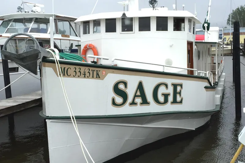 Slide: The Image of Custom 1993 Steel Trawler SAGE docked at marina. - 1