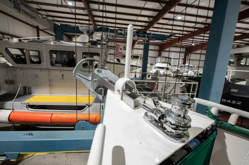 Slide: The Image of 1993 Custom Steel Trawler in a boatyard for maintenance. - 11