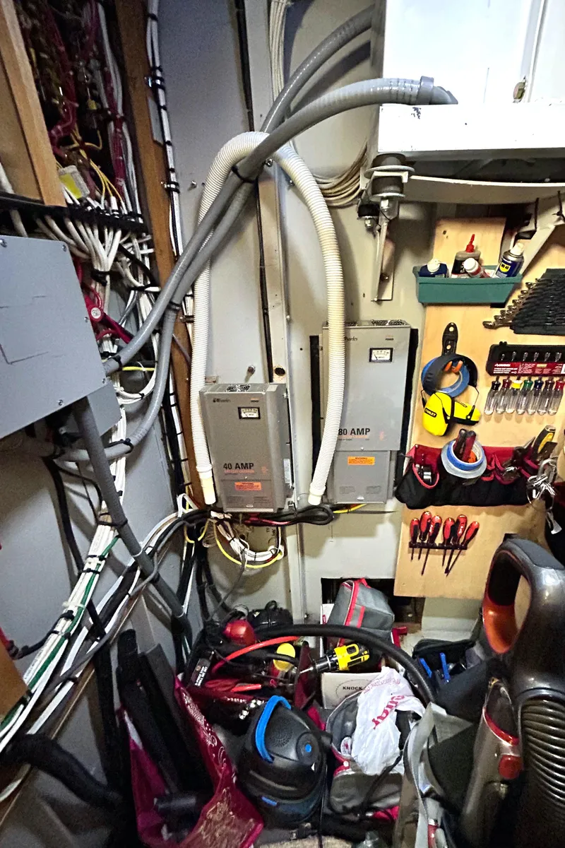 Slide: The Image of Electrical and tool storage area on a 1993 Custom Steel Trawler. - 28