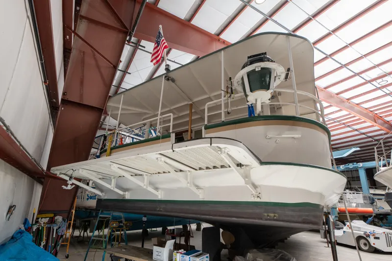 Slide: The Image of 1993 Custom Steel Trawler in a boatyard for maintenance. - 32