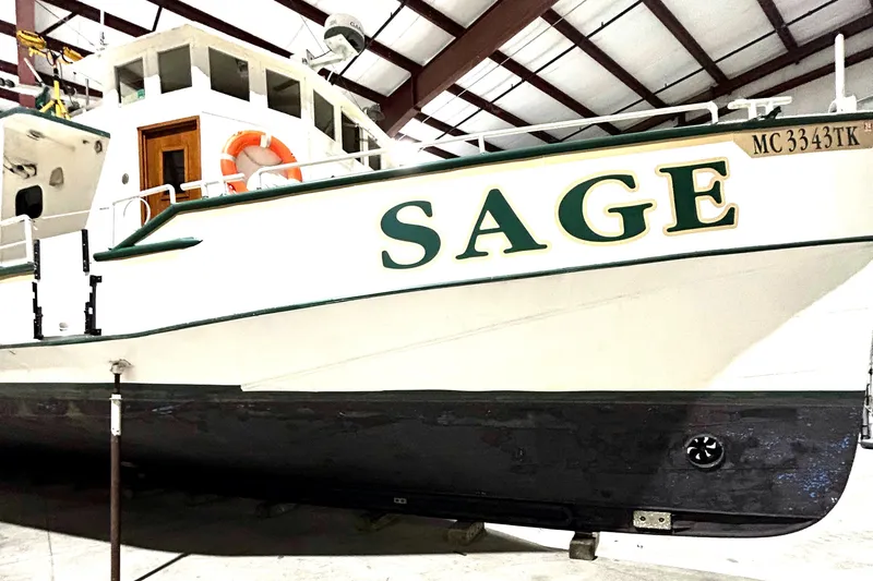 Slide: The Image of Custom 1993 Steel Trawler SAGE in dry dock, side view. - 5