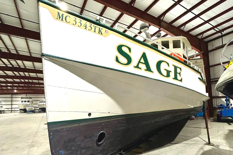 Slide: The Image of Custom 1993 Steel Trawler "SAGE" in indoor storage facility. - 6