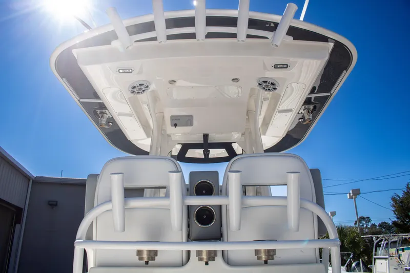Slide: The Image of 2021 Regulator 28 boat interior with seating and overhead view. - 20