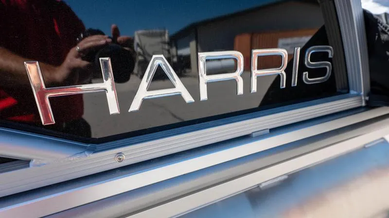 Slide: The Image of Close-up of 2024 Harris 230 Breeze boat logo. - 11
