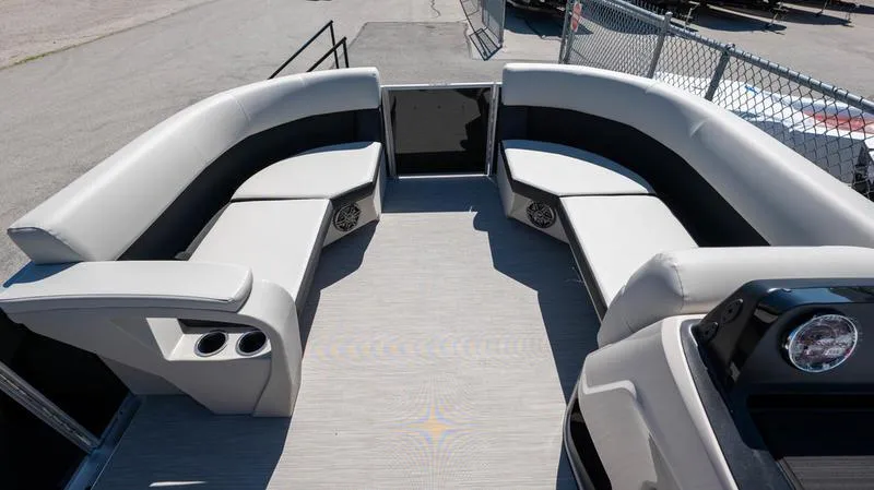 Slide: The Image of 2024 Harris 230 Breeze pontoon boat interior with spacious seating and modern design. - 12