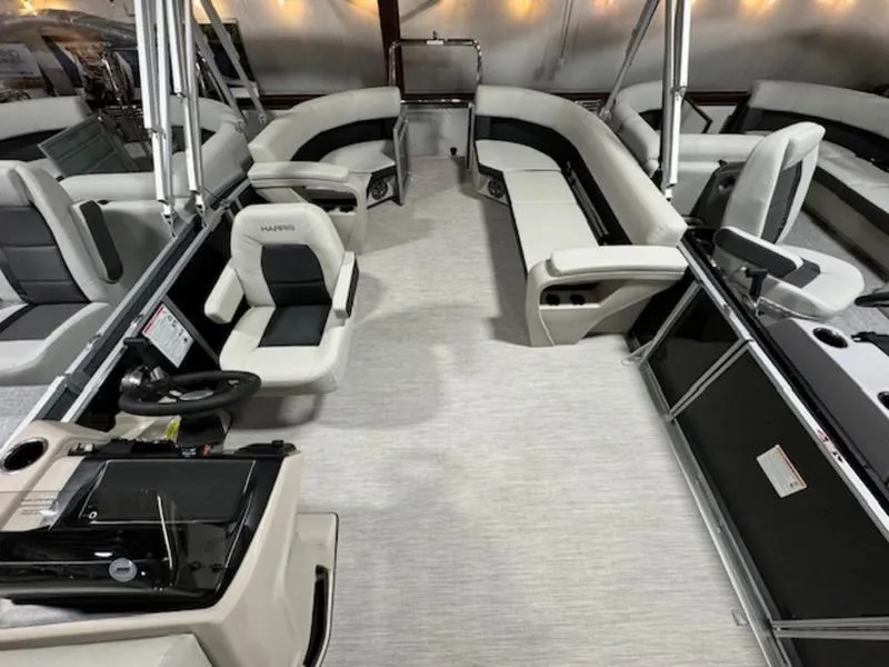 Slide: The Image of 2024 Harris 230 Breeze pontoon boat interior with spacious seating and modern design. - 6