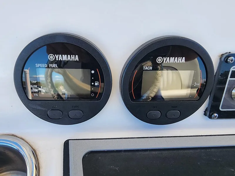 Slide: The Image of Yamaha speed and tach gauges on 2021 Sea Fox 228 Commander boat dashboard. - 17
