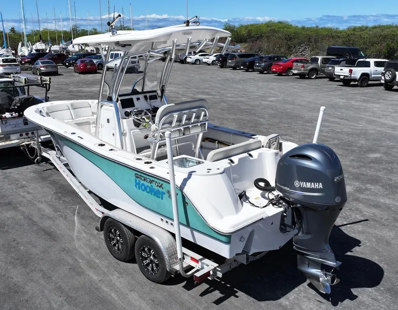 Slide: The Image of 2021 Sea Fox 228 Commander boat with Yamaha engine on trailer in parking lot. - 3