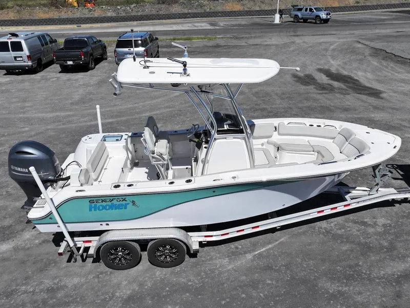 Slide: The Image of 2021 Sea Fox 228 Commander boat on trailer, featuring a Yamaha outboard motor. - 6