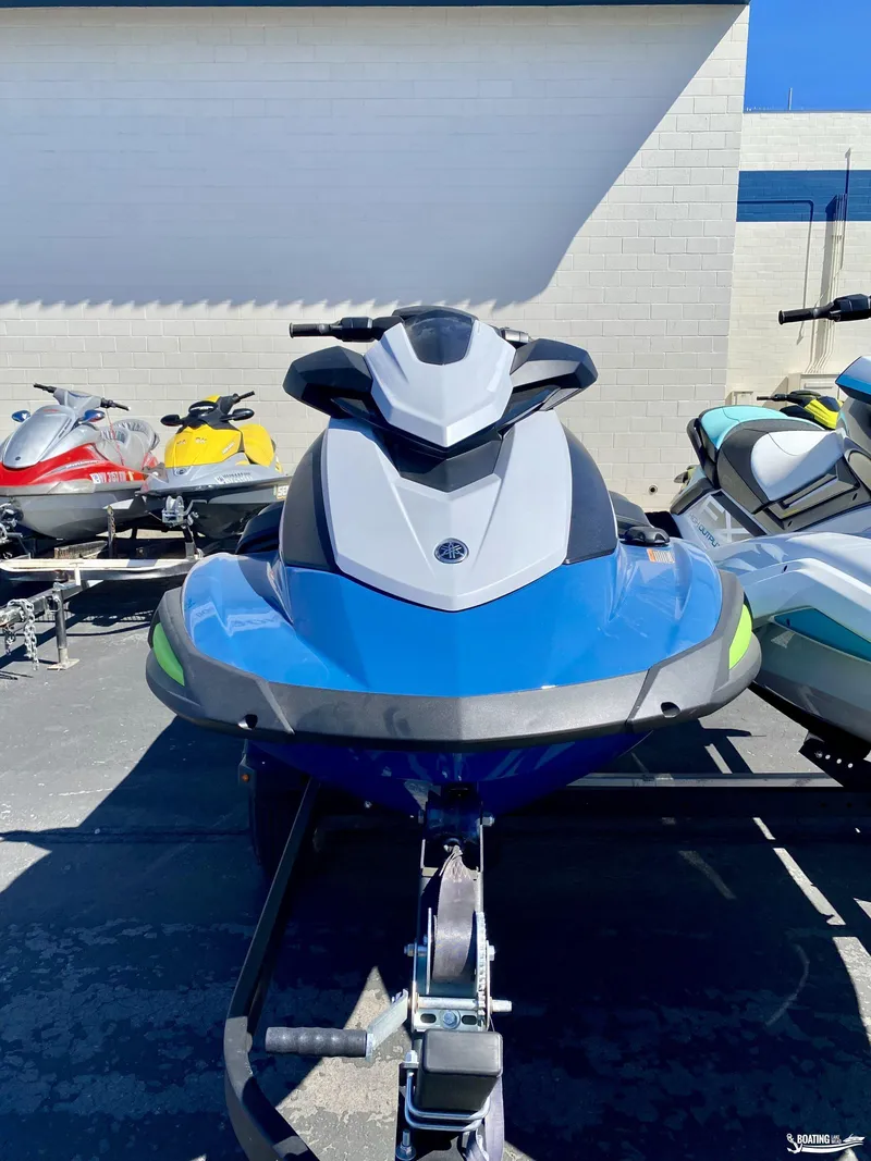 Slide: The Image of 2024 Yamaha WaveRunner VX Cruiser with Audio in blue, parked on a trailer. - 2