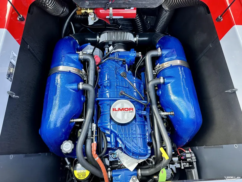 Slide: The Image of 2024 MasterCraft XT24 engine with blue Ilmor 6.0L MPI components. - 15