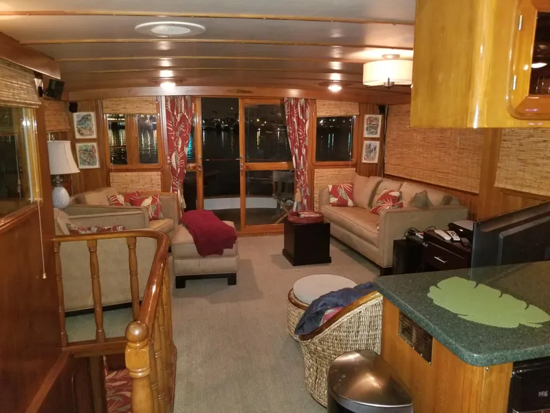 Slide: The Image of Luxurious interior of 1984 Angel Defever LRC yacht with cozy seating and elegant decor. - 11