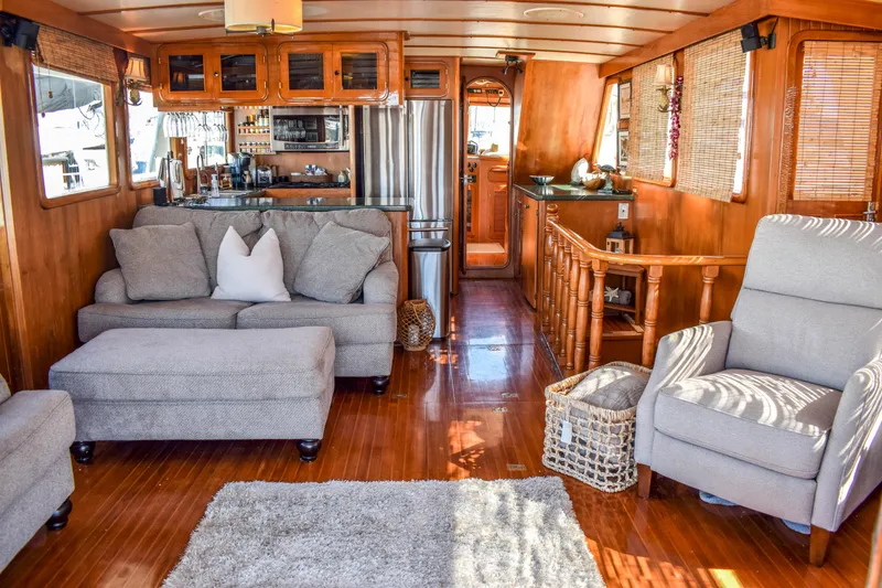 Slide: The Image of Luxurious 1984 Angel Defever LRC yacht interior with cozy seating, wooden accents, and modern amenities. - 12