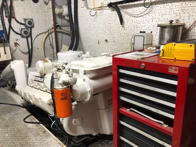 Slide: The Image of Engine room of 1984 Angel Defever LRC with tools and equipment. - 25