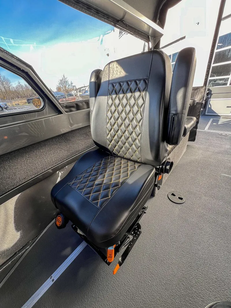 Slide: The Image of Luxurious seating in 2024 North River 25 Seahawk boat interior. - 11