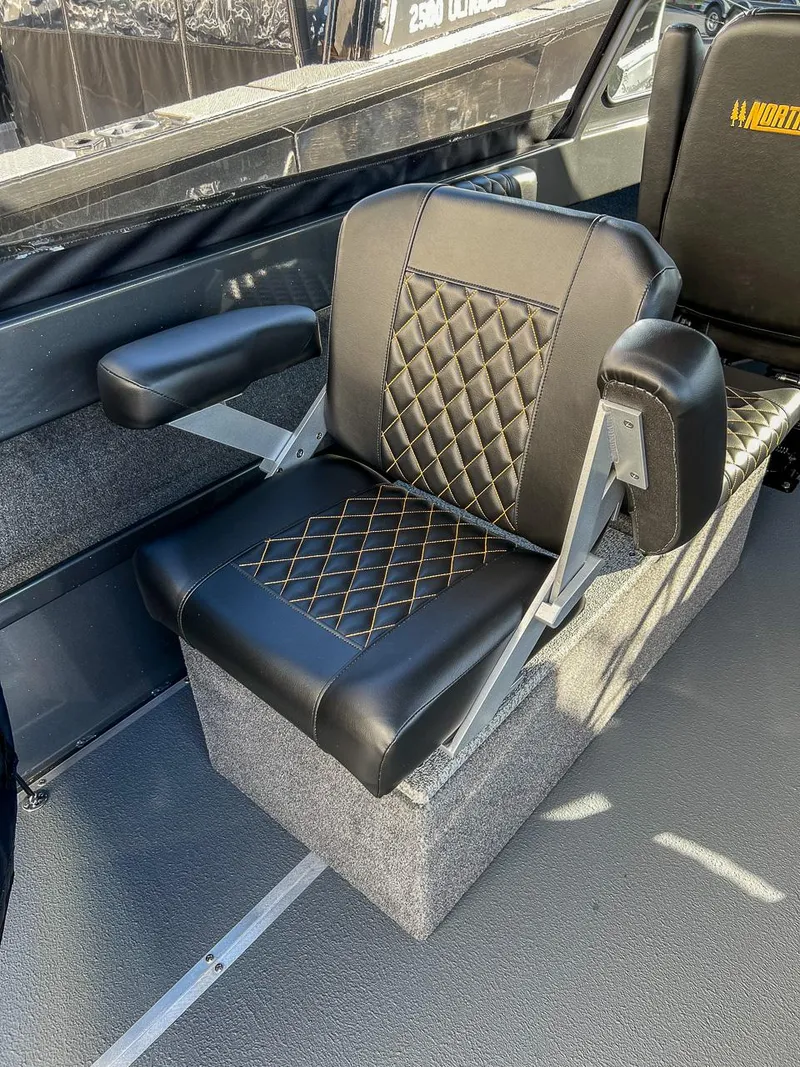 Slide: The Image of Luxurious seating in 2024 North River 25 Seahawk boat with diamond-stitched upholstery. - 15