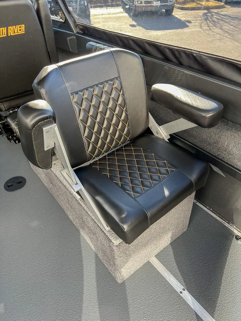 Slide: The Image of 2024 North River 25 Seahawk boat seat with black leather and diamond stitching. - 16