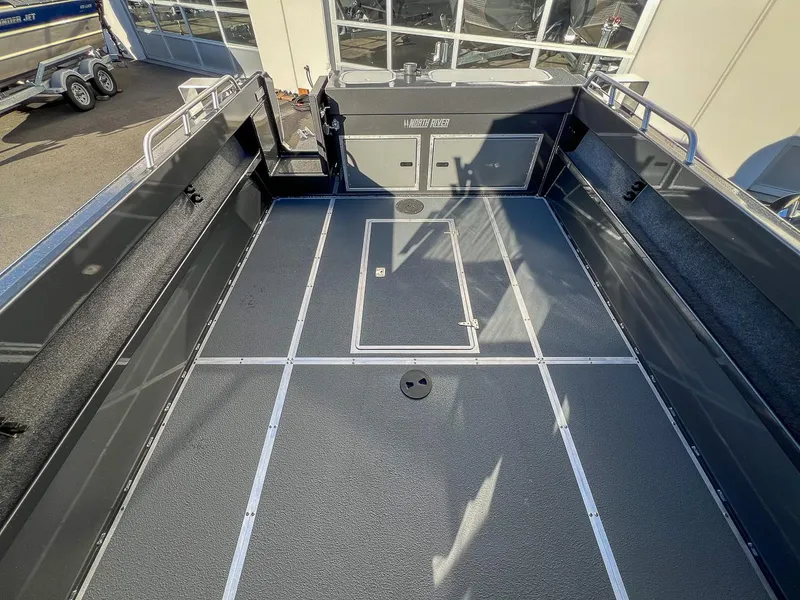 Slide: The Image of 2024 North River 25 Seahawk boat deck, spacious and well-equipped for fishing or leisure. - 17