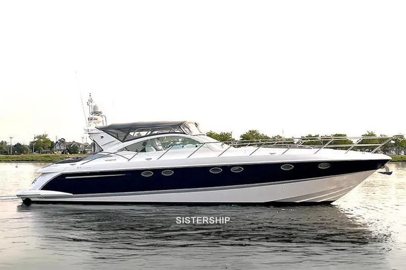 Slide: The Image of 2004 Fairline Targa 52 luxury yacht on calm water. - 1