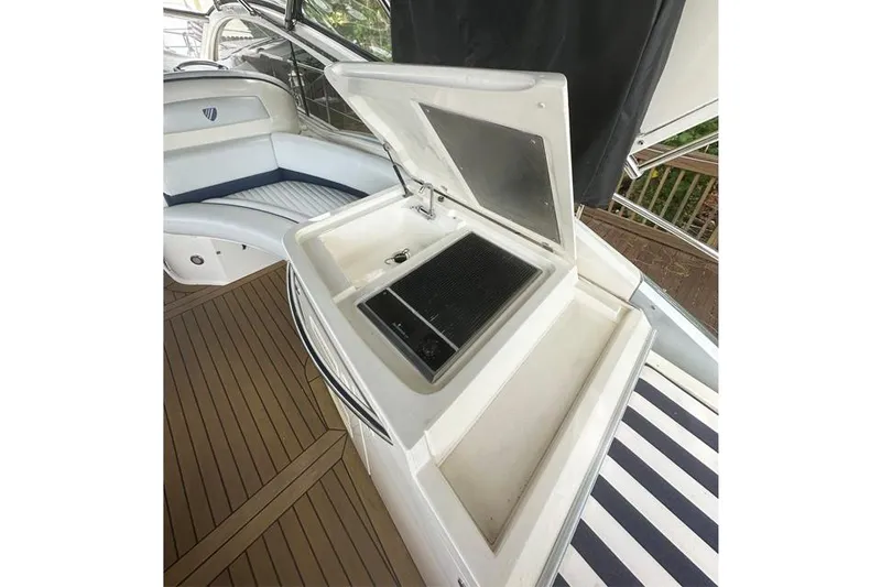 Slide: The Image of Fairline Targa 52 2004 yacht interior with open sink and seating area. - 4