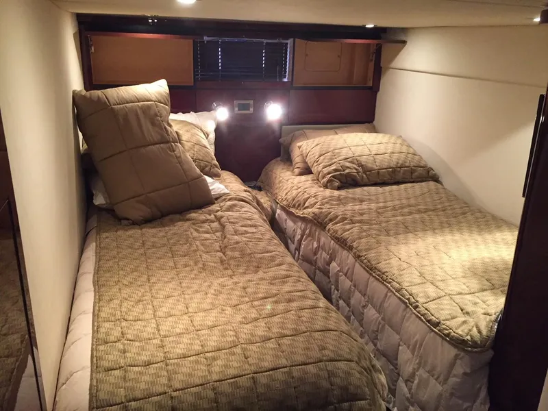 Slide: The Image of Interior view of 2008 Sea Ray 480 Sundancer yacht cockpit with modern navigation equipment. - 14