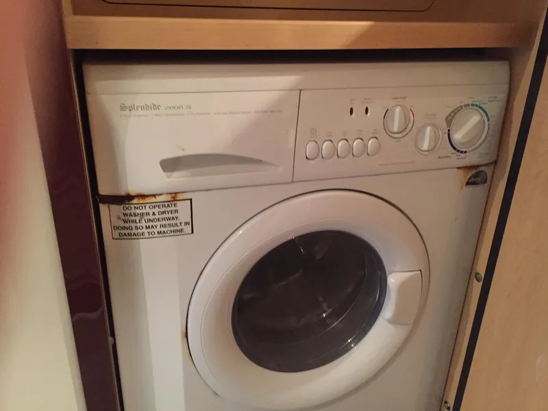 Slide: The Image of Helm of 2008 Sea Ray 480 Sundancer yacht with modern navigation equipment and plush seating. - 15