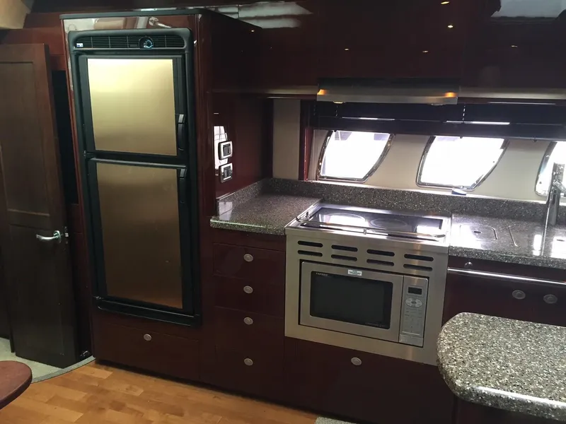 Slide: The Image of Luxurious 2008 Sea Ray 480 Sundancer yacht interior with elegant seating and ocean view. - 18