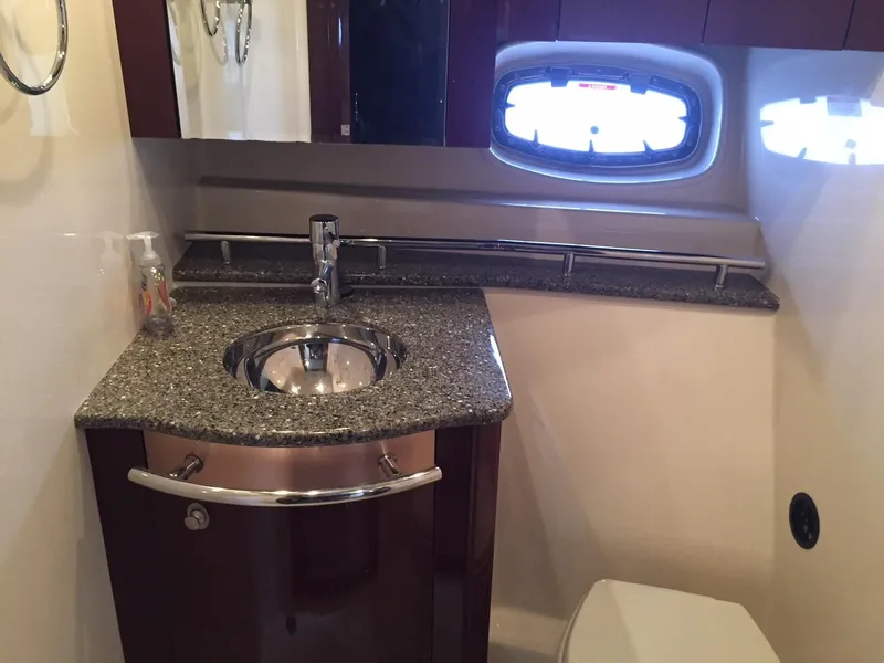 Slide: The Image of Interior of 2008 Sea Ray 480 Sundancer yacht with spacious seating and elegant design. - 20