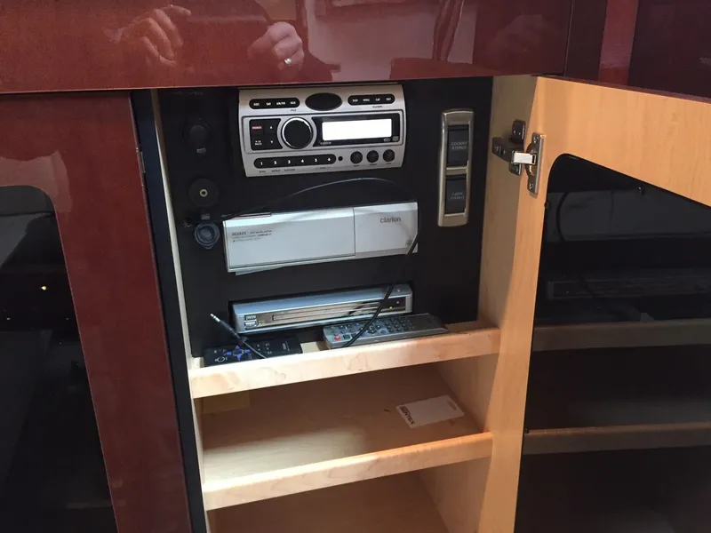 Slide: The Image of 2008 Sea Ray 480 Sundancer yacht interior with white seating and ocean view. - 22