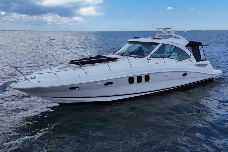 Slide: The Image of Interior view of 2008 Sea Ray 480 Sundancer yacht, featuring a cozy cabin entrance. - 27