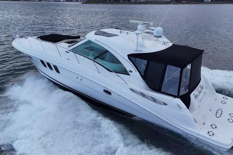 Slide: The Image of Luxurious cabin interior of 2008 Sea Ray 480 Sundancer yacht with cozy bedding. - 28