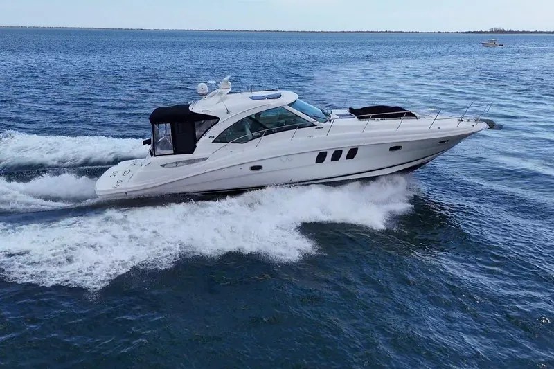 Slide: The Image of Luxurious bathroom in 2008 Sea Ray 480 Sundancer yacht with granite countertop and modern fixtures. - 29