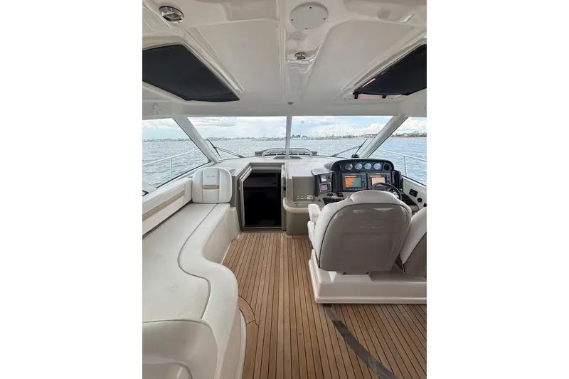 Slide: The Image of Entertainment system in a 2008 Sea Ray 480 Sundancer yacht cabinet. - 36