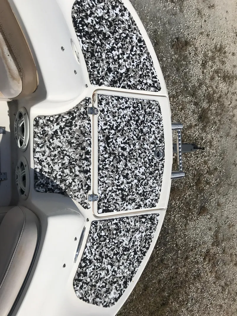 Slide: The Image of 2005 Chaparral Sunesta 252 boat deck with speckled pattern flooring. - 22