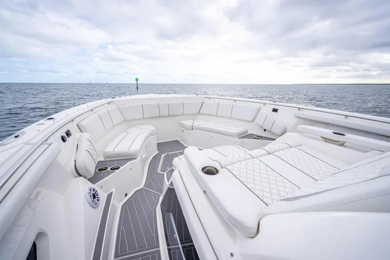 Slide: The Image of Luxurious seating area on 2022 Pursuit 428S boat with ocean view. - 28