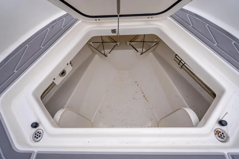 Slide: The Image of Spacious storage compartment of 2022 Pursuit 428S boat model. - 29