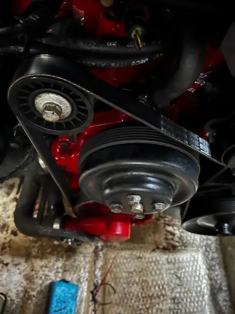 Slide: The Image of Close-up of the engine of a 2004 Regal 2665 Commodore Express boat. - 30