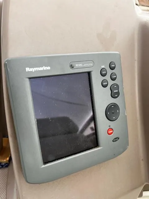 Slide: The Image of Raymarine RC435 chartplotter on 2004 Regal 2665 Commodore Express boat. - 11
