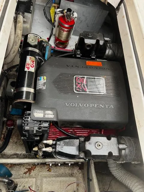Slide: The Image of 2004 Regal 2665 Commodore Express engine compartment with Volvo Penta motor. - 29