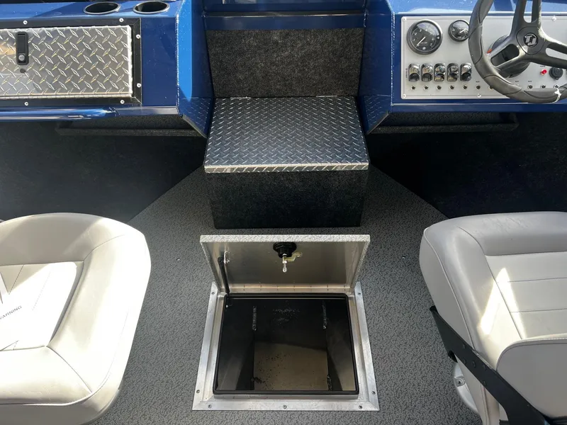 Slide: The Image of 2024 Thunder Jet 185 Luxor boat interior with storage compartment and seating. - 13