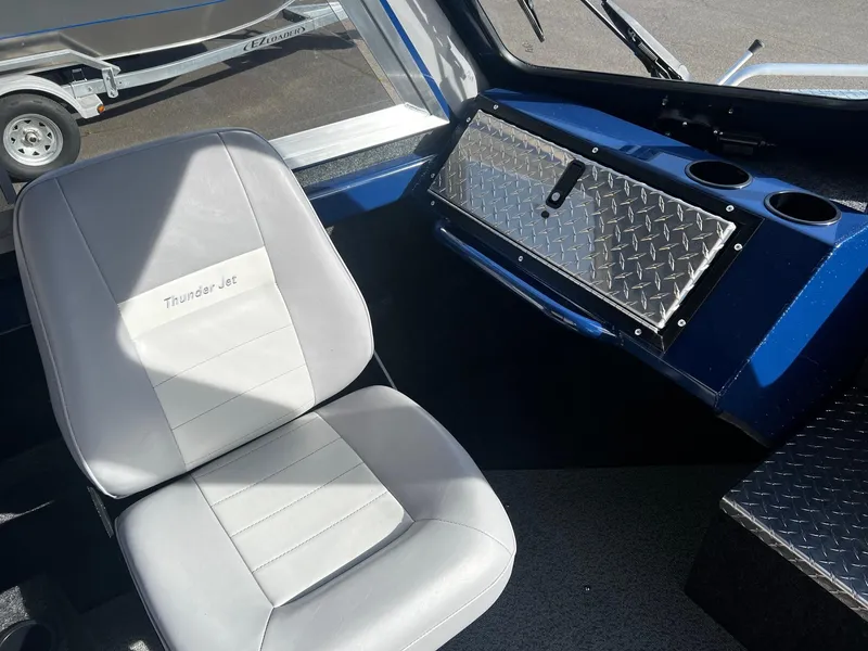 Slide: The Image of 2024 Thunder Jet 185 Luxor interior with driver's seat and dashboard. - 15