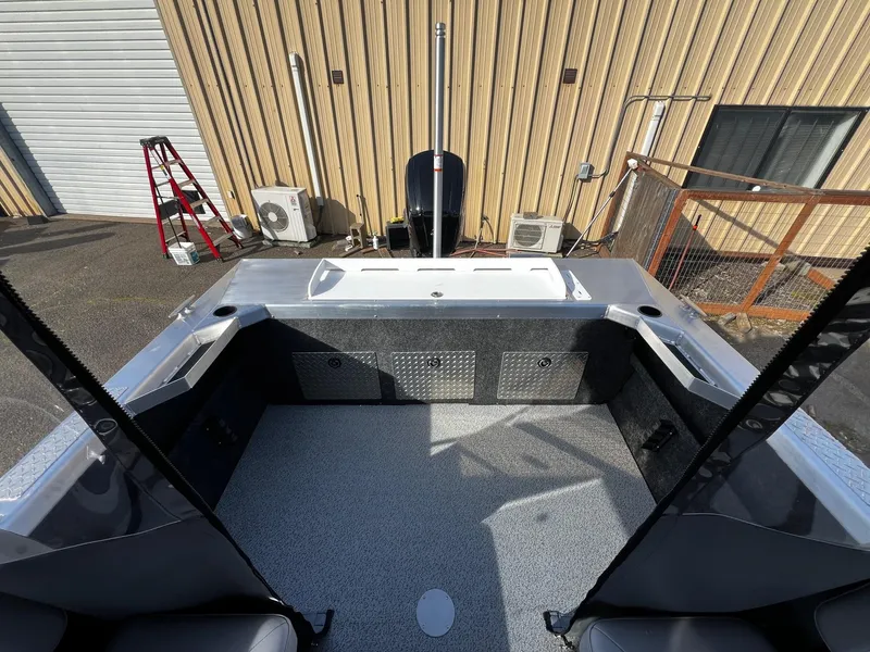 Slide: The Image of 2024 Thunder Jet 185 Luxor boat interior with spacious deck and storage compartments. - 19