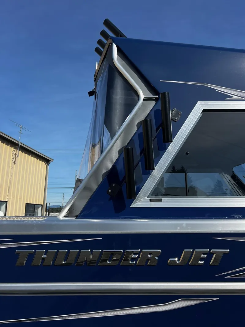 Slide: The Image of 2024 Thunder Jet 185 Luxor boat side view with logo. - 7